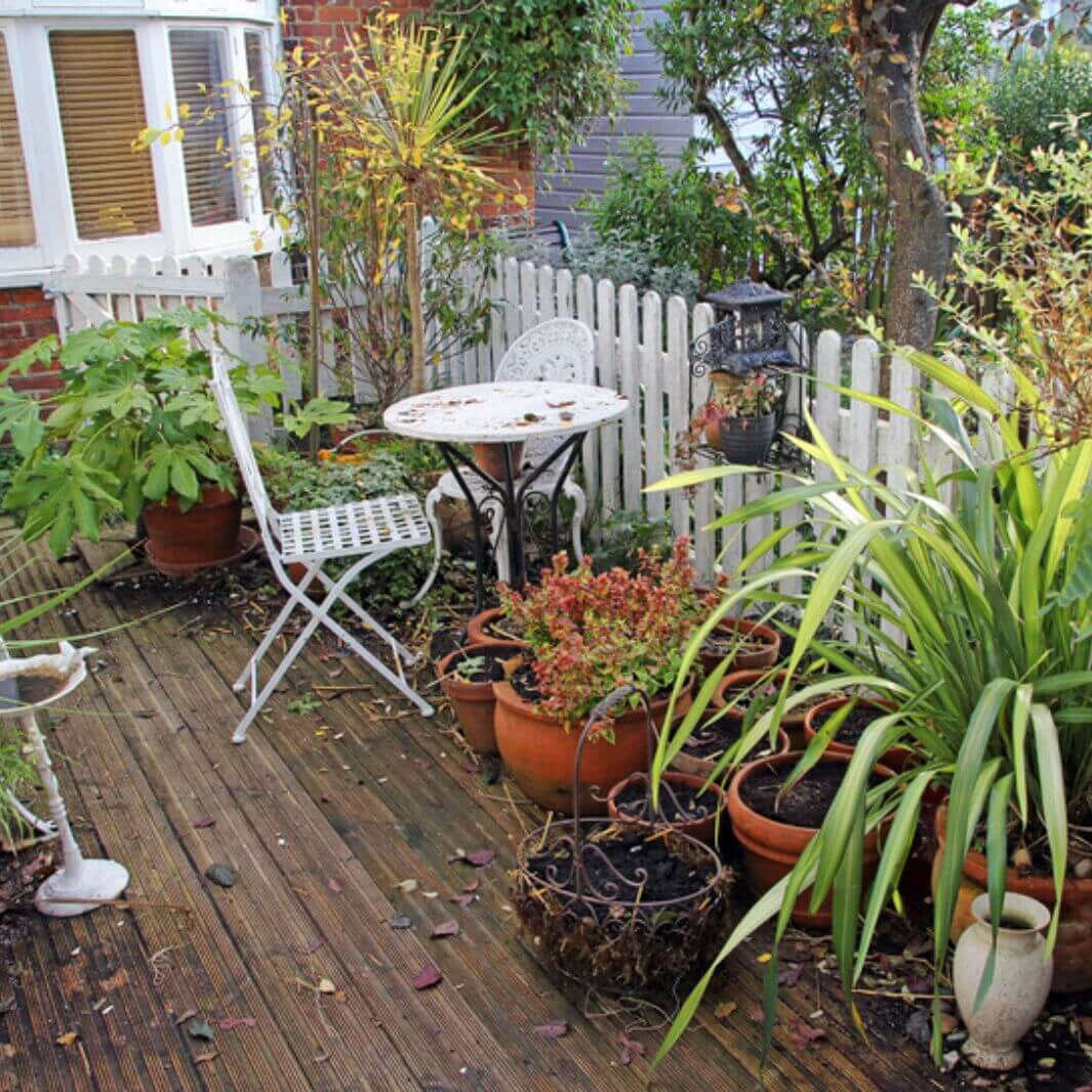 WADE BUILDING SUPPLIES | GARDEN DECKING IN AUTUMN WITH DEBRIS FROM HIGH WINDS AND RAIN