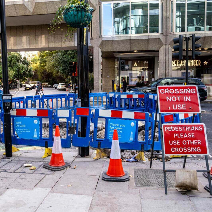 WADE BUILDING SUPPLIES | BLUE CHAPTER 8 FENCES AROUND A PEDESTRIAN CROSSING IN LONDON