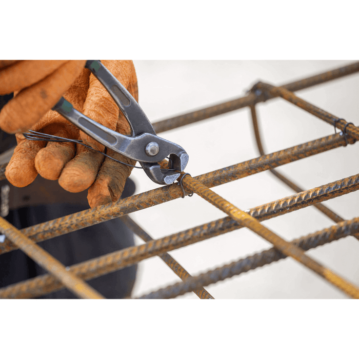 WADE BUILDING SUPPLIES | STEEL MESH BEING CONNECTED USING WIRE AND SPANNER